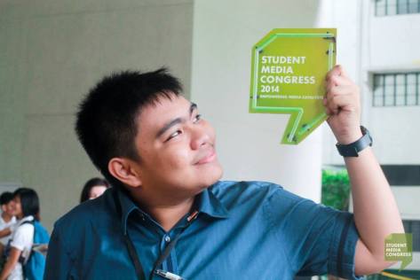 Well, that's me holding a Student Media Congress prop. Photo from the SMC Facebook page.